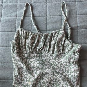 Green top with white flowers